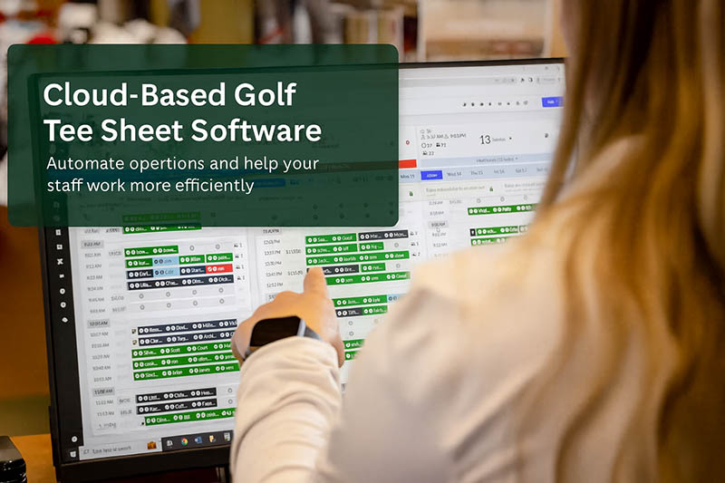 Golf course staff using cloud-based tee sheet software on a computer to automate scheduling and operations